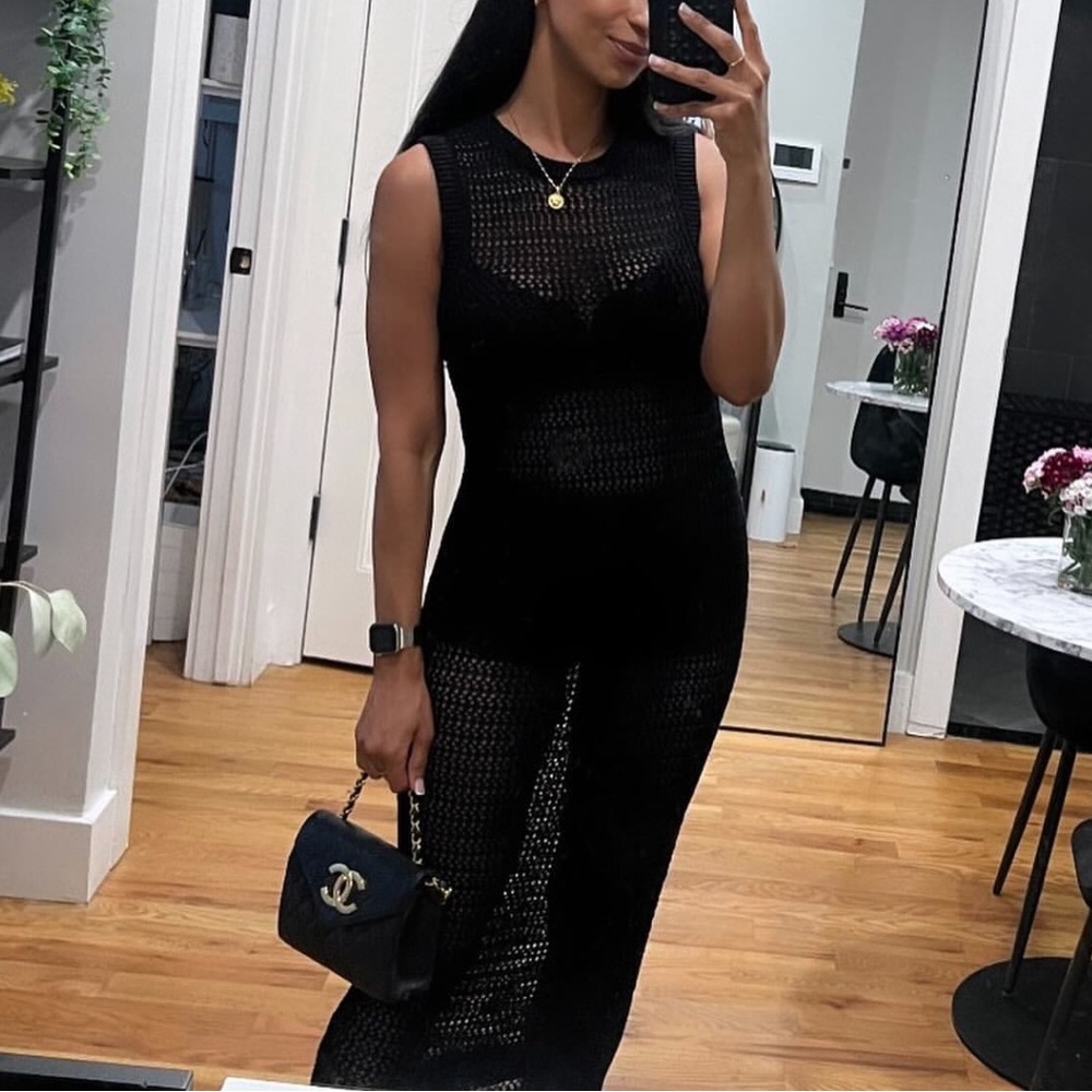 Elegant Black Sleeveless knit cover up.